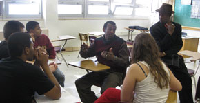 Professor Derrick Hudson imparts valuable lessons to students. photo by Rhea Boyd.