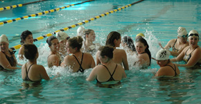 Girls swimming celebrates placing 3rd at city. Photo by Rebecca Holt